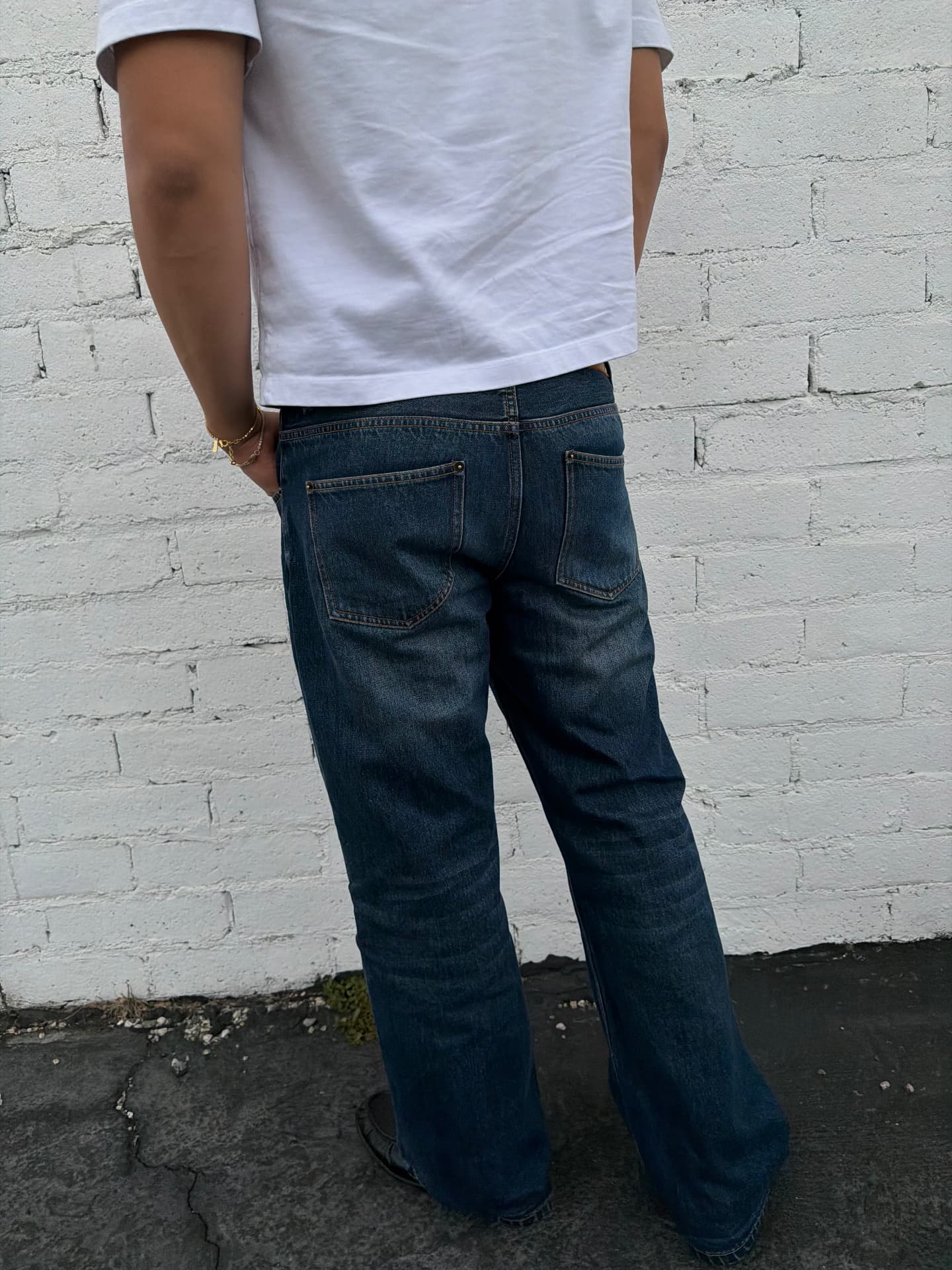 Back view of the Jireh jean worn with a white tee